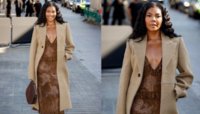 Gabrielle Union Embraces Autumnal Shades in Taupe Trench & Chocolate Dress at Burberry Show During London Fashion Week