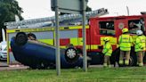 Car overturns after crash on Dundee roundabout