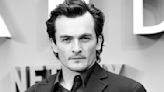 Rupert Friend Tapped to Lead ‘The Yellow Tie’ Alongside John Malkovich, Based on Life of Famed Romanian Conductor Sergiu Celibidache...