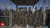 Israel court hears bid to close prison where soldiers are accused of sexually assaulting Palestinian - Times of India