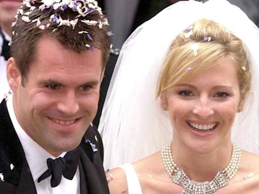 Gabby Logan was all smiles in cascading bridal dress and pearl choker on wedding day