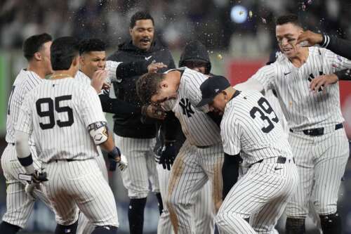 Stanton and Rizzo help Yankees rally in 9th inning for 2-1 victory over Tigers