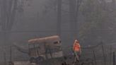 California forest fire kills 2, rainfall helps fight flames