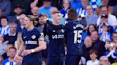 Nkunku inflates blue balloon to celebrate goal in Chelsea's 2-1 win at Brighton in Premier League