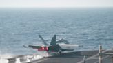 A US Navy carrier strike group locked in a Red Sea battle has fired over 500 munitions fighting the Houthis