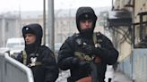 Russia police launch major manhunt after troops massacred by comrade