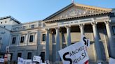 Supporters of Spain’s prime minister rally in Madrid to urge him not to quit