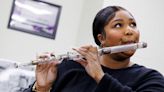 Lizzo Tours Library of Congress to Play Historic Flutes & ‘Of Course, She Had to Twerk’