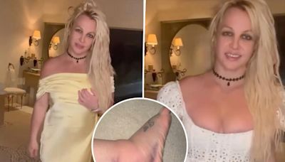 Britney Spears claims her massively swollen foot is ‘already better’ after it was ‘broken’ at Chateau Marmont