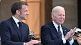 Shocking moment doddering Joe Biden helped by Emmanuel Macron at D-Day parade