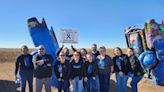 Cadillac Ranch goes blue and pinwheels are planted for Child Abuse Prevention Month