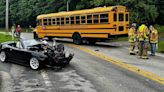 Driver taken to hospital after school bus, Miata collide