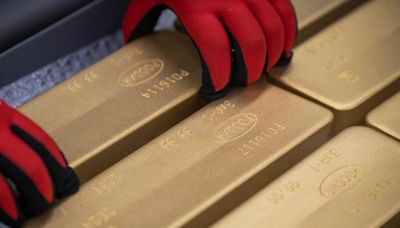 Gold hits over 2-week low as investors book profit; US data in focus