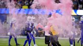 Protesters interrupt NFL's Bills-Rams season-opener with pink smoke bombs