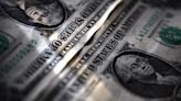 Dollar rebounds as equities dip, eyes on Treasury auctions