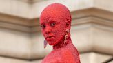 Doja Cat says she was 'super ill' while wearing her viral red Swarovski crystal suit at Paris Fashion Week: 'My stomach felt like there was a blade in it'