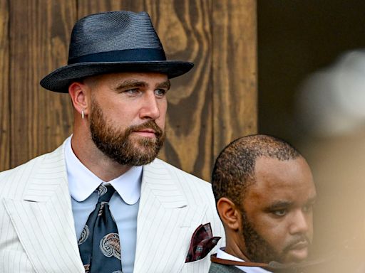 Travis Kelce looks dapper at the Kentucky Derby in pinstripe suit and fedora