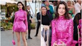 Anne Hathaway dazzled in a hot-pink minidress and matching platform heels at Valentino's Haute Couture show in Italy