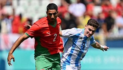 Fan invasion suspends Argentina, Morocco game