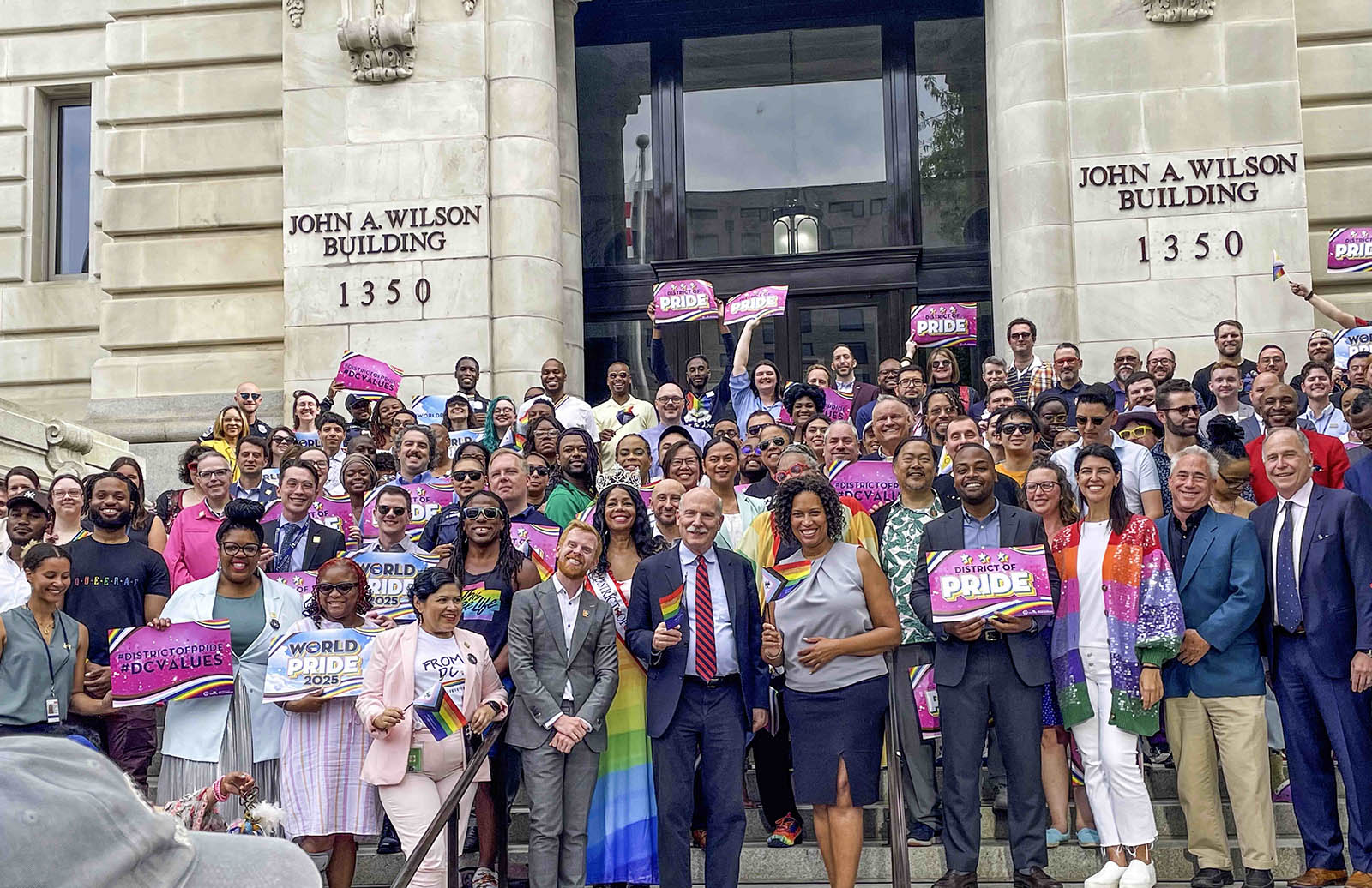 D.C. Leaders Raise Progress Pride Flag Over Wilson Building