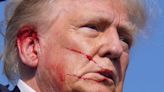 The man who photographed a bloodied and defiant Trump says he 'knew it was a moment in American history that had to be documented'