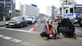 Berlin activists glue themselves to roads causing ‘massive’ disruption across the city