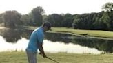 golfer throws golf club into pond and then throws hat at camera after a bad shot