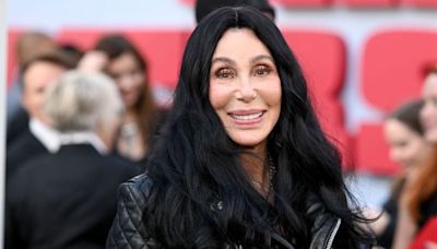 Cher goes full throttle in leather look for a summer film premiere