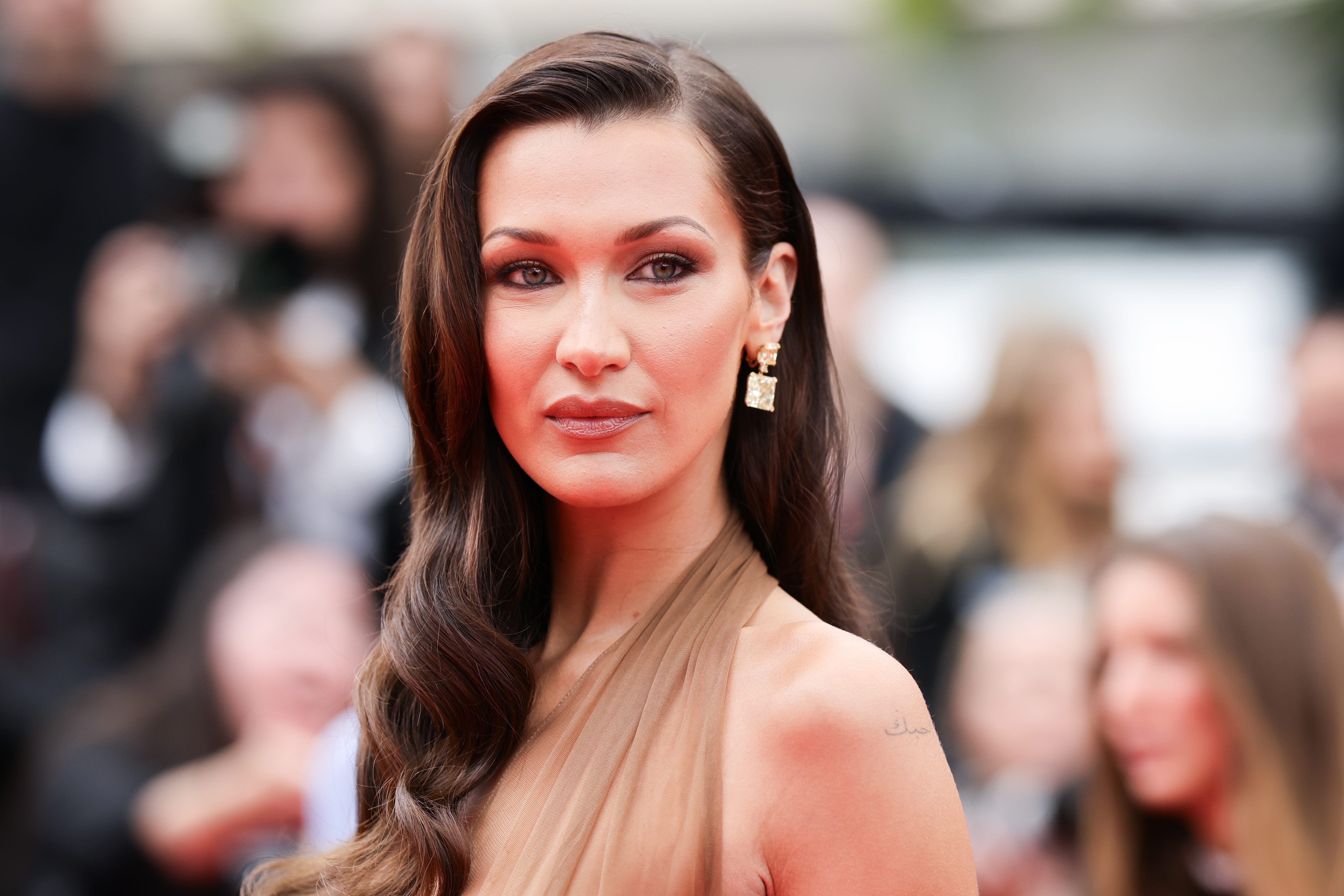 Bella Hadid returns to Cannes in sultry sheer Saint Laurent dress