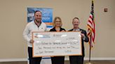 GOOD DEEDS: Commercial Real Estate Alliance donates $10,000 to Habitat