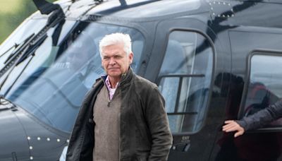 Philip Schofield arrives by helicopter at Silverstone
