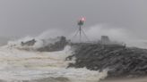 Ophelia weakens to tropical depression as it dumps inches of rain along upper East Coast