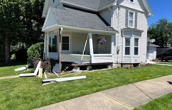 House damaged after two-car crash in Elmira