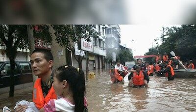 Search underway for dozens missing after flooding leaves 25 dead in China