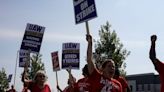 UAW strikes more GM, Stellantis facilities, cites progress in talks with Ford