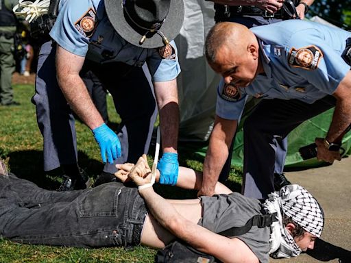 Emory faculty push for no-confidence vote of university president a day after tense protests