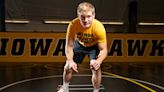 Iowa wrestling's Nelson Brands announces that he will return for one more Hawkeyes season