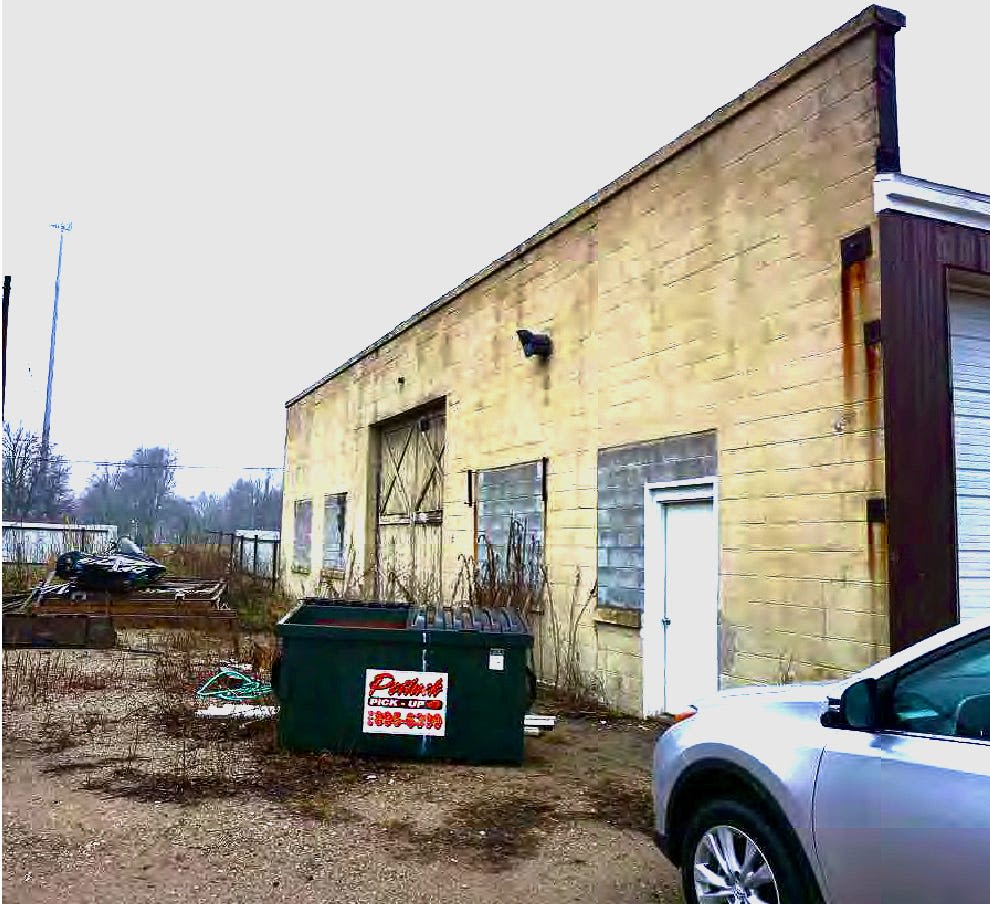 What does it mean to redevelop a brownfield site in Ottawa County?