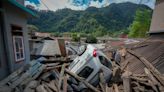 Indian rescuers are flying into the region where a flood washed out bridges and killed at least 74