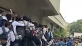 Railing Collapses As 1,800 Aspirants Appear For A Job With 10 Positions in Gujarat | On Cam - News18