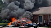 VIDEO: 1 hospitalized after car crash narrowly misses house before bursting into flames