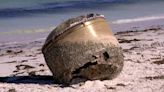 Mystery cylinder on Western Australia beach likely space junk, authorities say