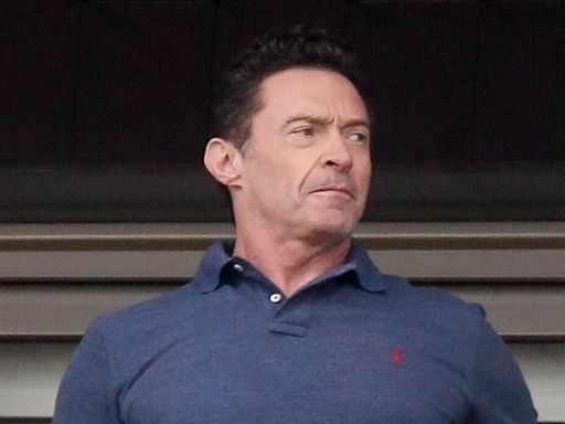 Hugh Jackman nurses injured finger in Brazil