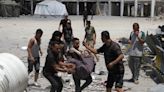 Israeli airstrike kills eight at Gaza aid centre, witnesses say