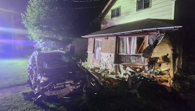Lucky family escapes injury after car crashes into home