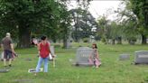 Newport News American Legion Post 25 lays flags at veterans' graves