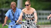 Jennifer Lopez laughs as she bicycles in a bra top in the Hamptons