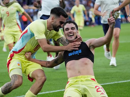 Spain fights off France in extra time for men's soccer gold