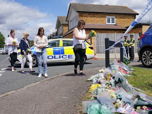 UK inquest hears how 1 of 3 women killed at home in crossbow attack managed to text for help