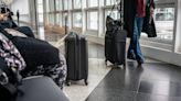 Woman tries to get around airline luggage policy by hiding bag under her shirt
